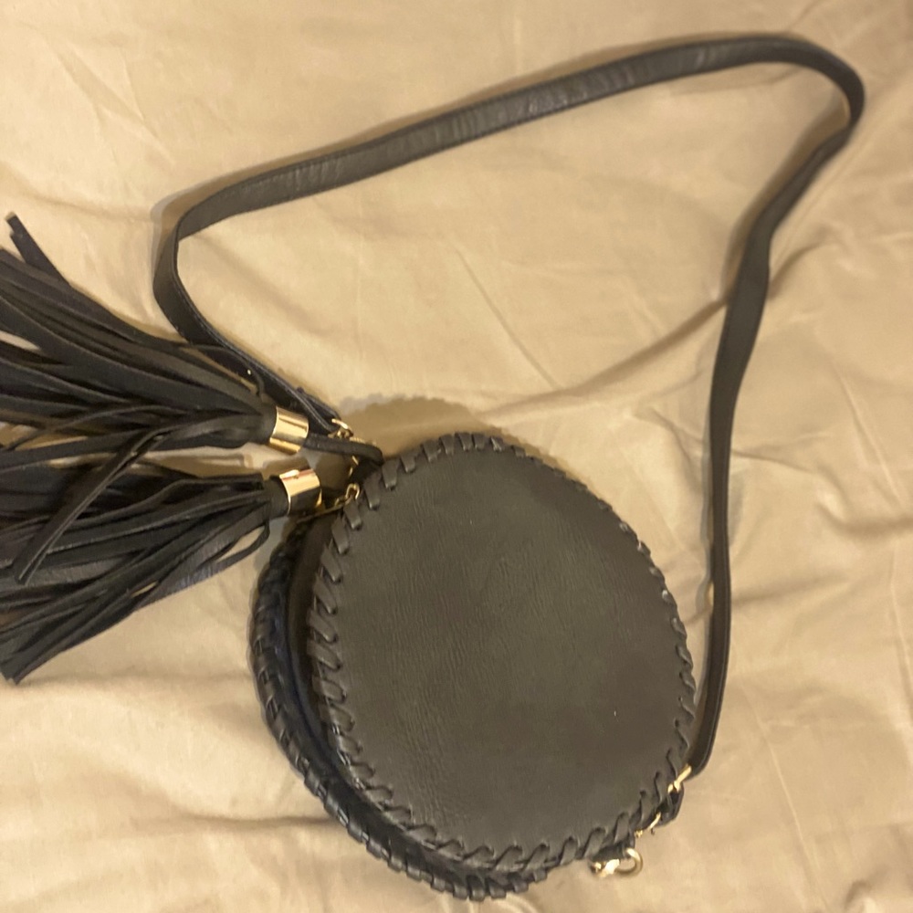 Boho chic crossbody bag. Great for all seasons.